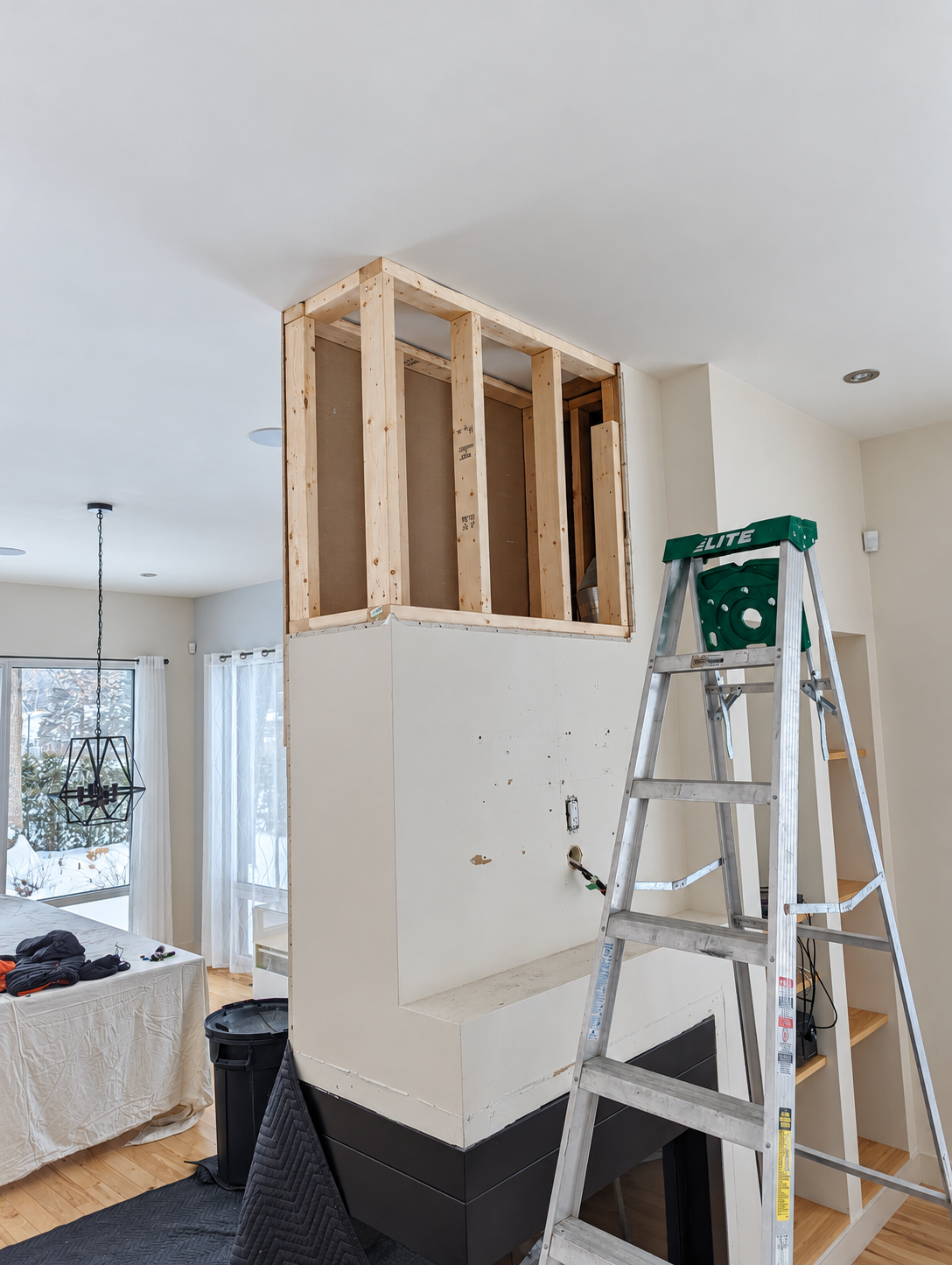 Fireplace surround during construction — Sainte-Julie.